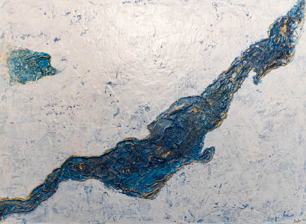 Abstract art piece with blue and gold patterns on a textured white background