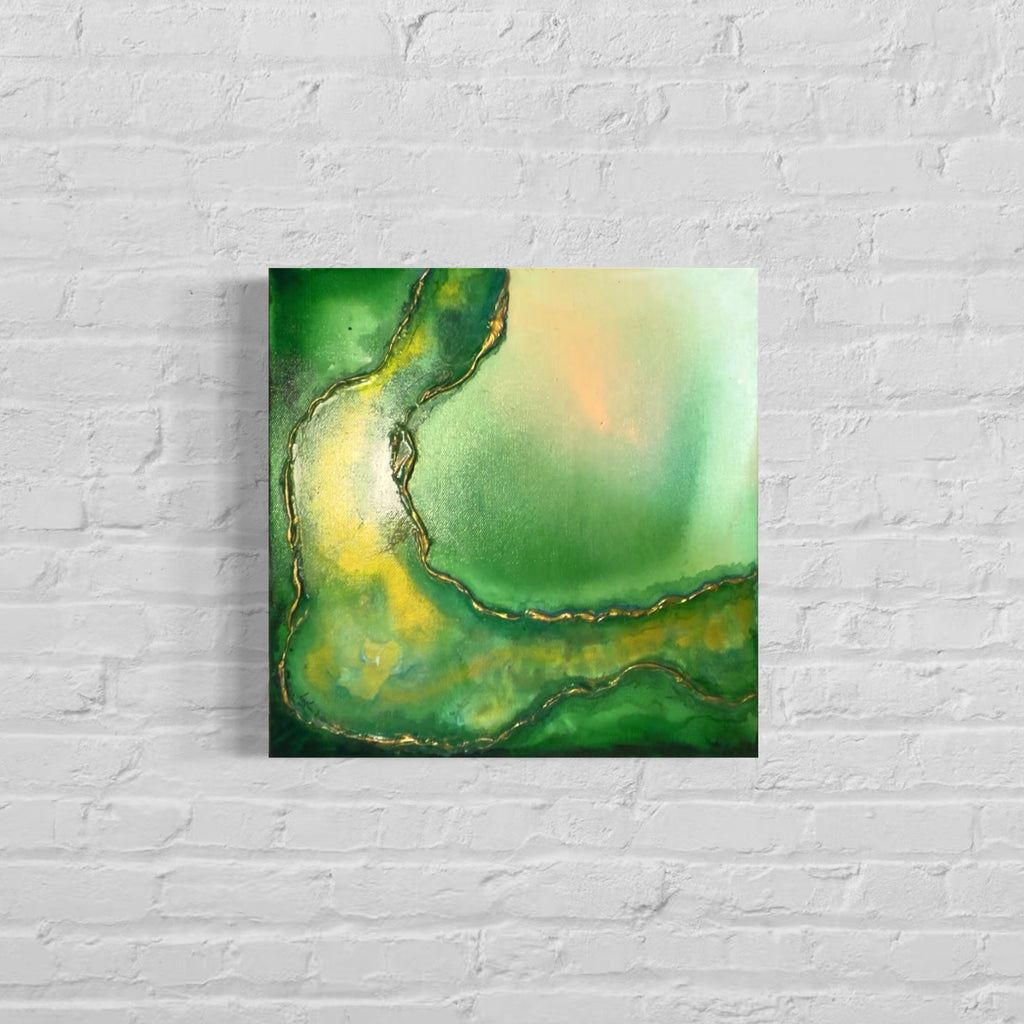 Abstract painting with green and yellow hues on a white brick wall